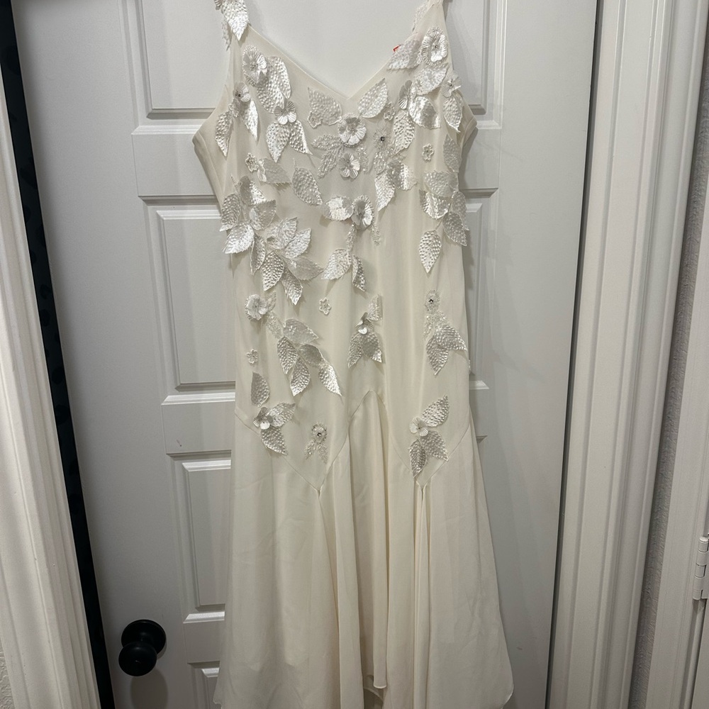 Elegant White Dress with Silver Leaf Accents